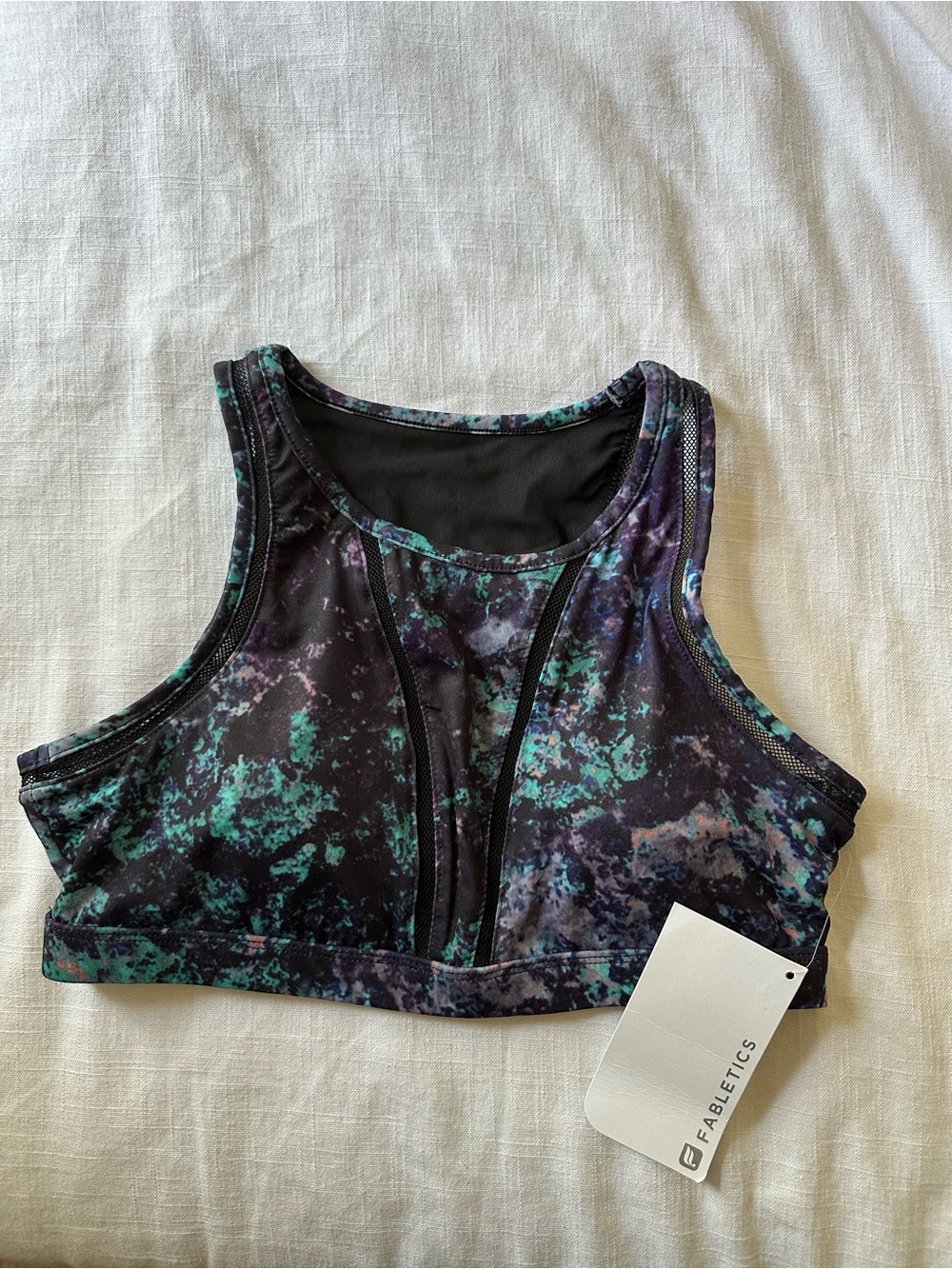 Fabletics Milda High-Neck Sports Bra — Teal, Purple & Black Print